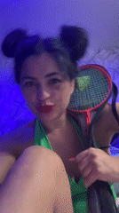 Woman poses with badminton racket in Russia