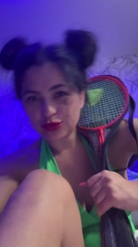 Woman poses with badminton racket in Russia