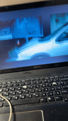 Person watches multiple video clips on laptop in Varna