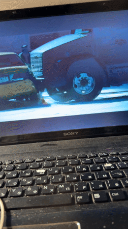 Person watches multiple video clips on laptop in Varna