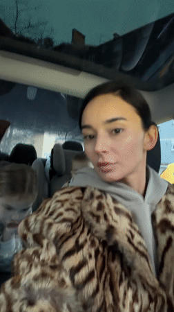 Woman takes selfies in car with children in Rijeka