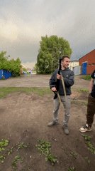 Recreational shooting gathering documented in Chaikovsky, Russia under rainbow