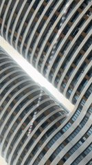 Modern curved high-rises documented in Tel Aviv dawn hours