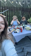 Women gather for outdoor grilling meal in Izhevsk