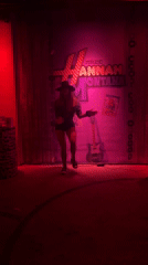 Solo dancer performs at illuminated venue in Varna, Bulgaria