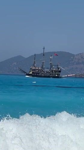 Pirate-style tour boat cruising Fethiye's turquoise waters