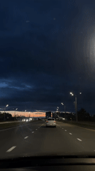 Evening highway drive captured in Kazan at dusk