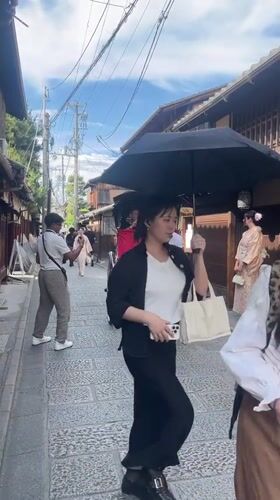 Morning street life and anime culture observed across Kyoto