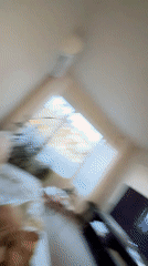 Woman records selfie videos in Sofia apartment wearing sequined dress