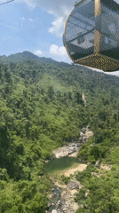 Cable cars and crowds at Ba Na Hills' iconic Golden Bridge