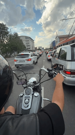 Afternoon motorcycle ride with street scenes and personal snapshots
