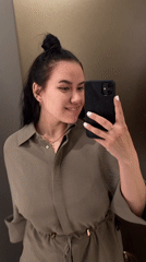 Woman Takes Playful Fitting Room Selfies at Perm Clothing Store