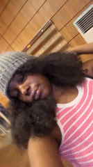 Woman takes mirror selfies in Abuja hotel room