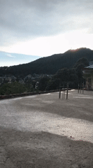 Rooftop life documented in Haini: exercise, cat, mountain views