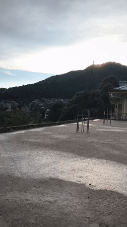 Rooftop life documented in Haini: exercise, cat, mountain views