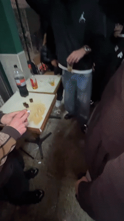 Late-night social gathering observed at Bragança bar