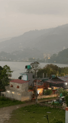 Foggy weather blankets Pokhara's mountains and lake district