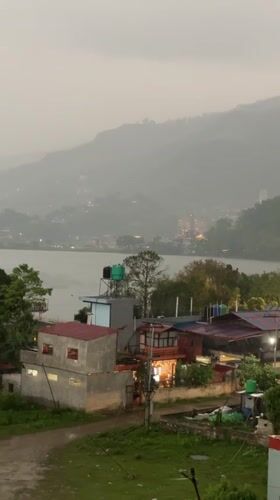 Foggy weather blankets Pokhara's mountains and lake district