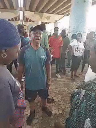 Group gathers under painted overpass in Jos, Nigeria