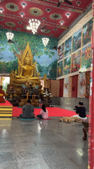 Inside a Ko Samui Buddhist temple, late morning visit