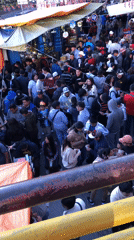 Evening crowd browses busy La Paz street market