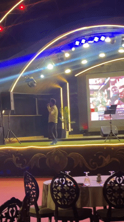 Live brass band and vocalist perform at outdoor night event in Baku