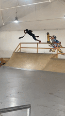 Scooter tricks at an indoor skate park in l'Hospitalet