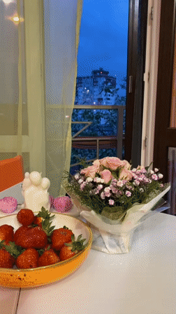 Romantic table setting captured on Sochi balcony at dusk