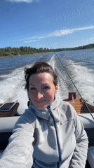 Boat day on a Russian lake with a dog and fishing gear