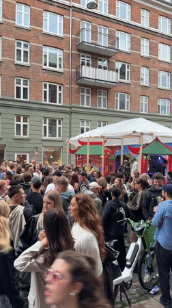 Young crowd gathers for street party in Copenhagen