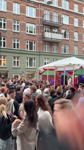 Young crowd gathers for street party in Copenhagen