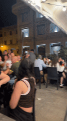 Evening dining scene unfolds at Bari pizzeria