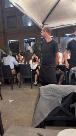 Evening dining scene unfolds at Bari pizzeria