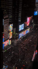 Night crowds and traffic observed in Times Square