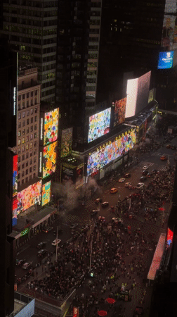 Night crowds and traffic observed in Times Square