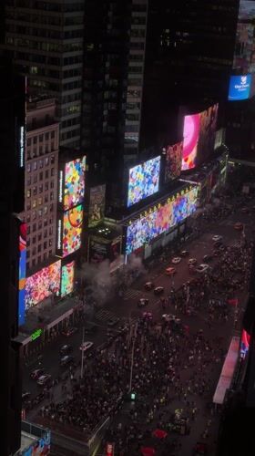 Night crowds and traffic observed in Times Square