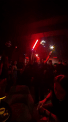 Sparklers and wine bottle light up a Bali nightclub
