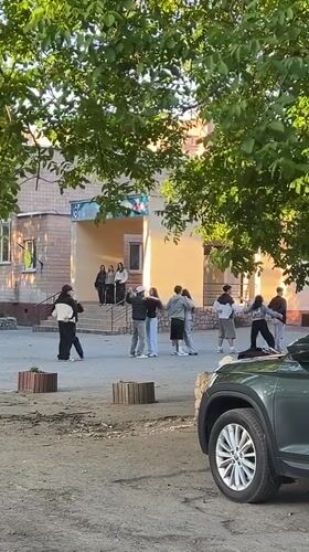 Casual afternoon scenes documented across Ternopil, Ukraine including M&M statue