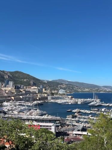 Monaco harbor bustling with yachts captured in afternoon footage
