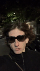Person films themselves outdoors at night in Buenos Aires