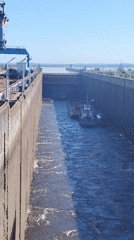 Boy fishing at Kama River lock system, Chaikovsky Russia