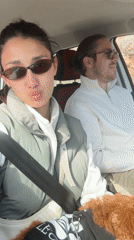 Couple shares playful moment in car in Montenegro