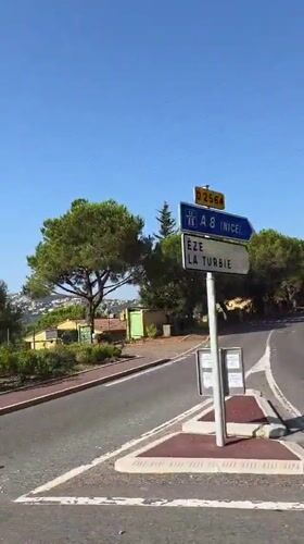 Junction signs near La Turbie point toward Nice and the A8