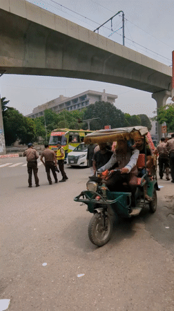 Morning street life documented across Dhaka during rush hour