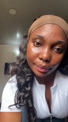 Woman recorded at indoor location in Abuja, Nigeria
