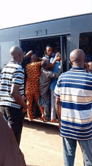 Morning commuters crowd to board bus in Sabon Tasha