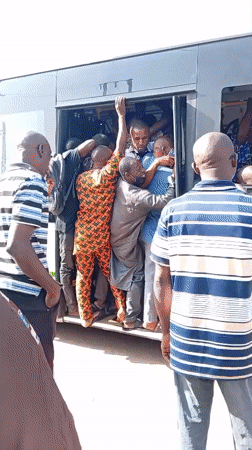 Morning commuters crowd to board bus in Sabon Tasha