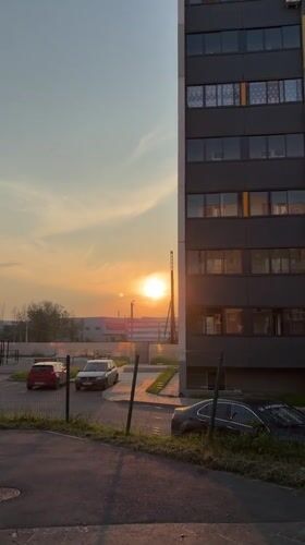 Warm sunset light over a Yekaterinburg residential street