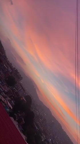 Caracas skyline captured at dusk with colorful sky