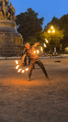 Fire juggling with torches at a Saint Petersburg night event